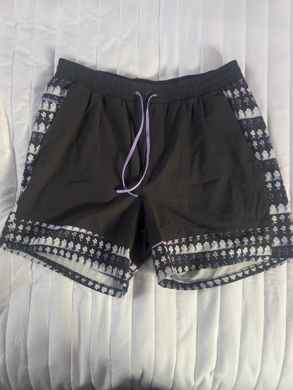 Nike Black Athletic Shorts with Lavender Drawstring and Patterned Trim